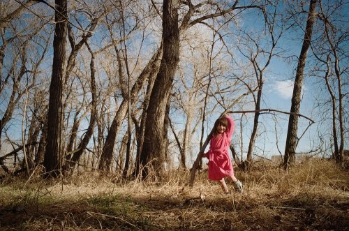 Ayla-with-Trees.jpg